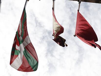 The Basque flag (left) flys outside Pamplona City Hall on Thursday.