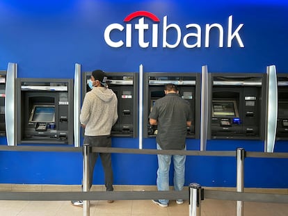 Customers use ATMs at a Citibank branch in the Jackson Heights neighborhood of the Queens borough of New York City, U.S. October 11, 2020.