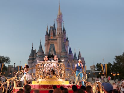 Mickey and Minnie Mouse perform during a parade at the Magic Kingdom theme park at Walt Disney World in Lake Buena Vista, Florida, in 2020.