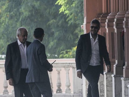 Marcelo Tinelli e Rodolfo D'Onofrio entrando na Casa Rosada.