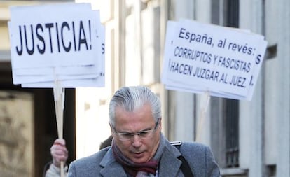 Spanish Judge Baltasar Garzon arrives for his trial on February 8. 