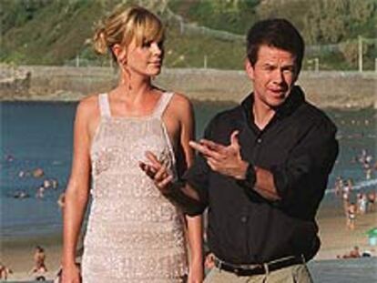 Charlize Theron y Mark Wahlberg, protagonistas de <i>The italian job, </i><b>ayer</b> en San Sebastián.