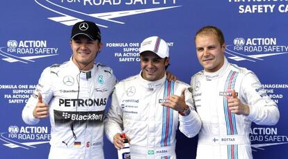 De izquierda a derecha, Rosberg, Massa y Bottas en el podio de la 'pole'.