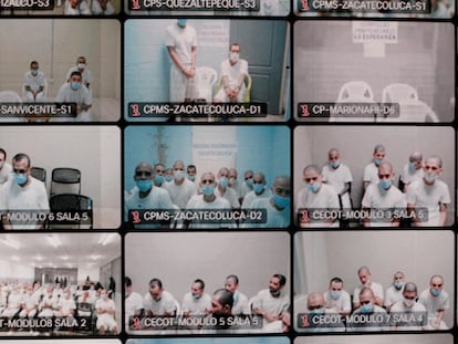 Alleged members of the Mara Salvatrucha gang appear on a screen during a remote hearing as part of a mass trial against nearly 500 gang members in San Salvador, El Salvador, February 8, 2024. REUTERS/Jose Cabezas