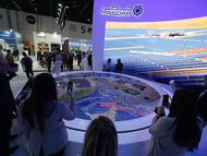 Visitantes en el pabellón Masdar durante la Cumbre Mundial sobre la Energía del Futuro 2026 (WFES) en Abu Dabi.