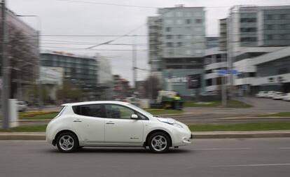 An electric car circulates by Tallin.