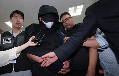 A man who opened an emergency exit door during a flight, arrives to attend an arrest warrant review at the Daegu District Court in Daegu, South Korea, on May 28, 2023.
