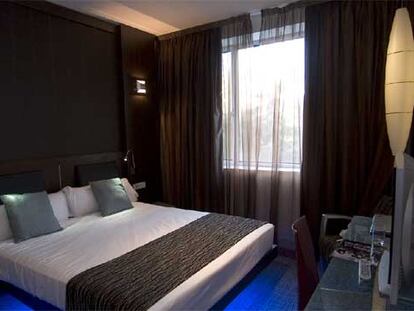 Una de las habitaciones del hotel High Tech President de Madrid (interiorismo de Jesús Ángel Miranda).