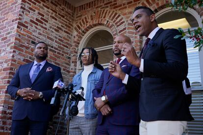 FedEx driver D'Monterrio Gibson, second from left, stands with his legal team of attorneys in Ridgeland, Mississippi, in 2022.