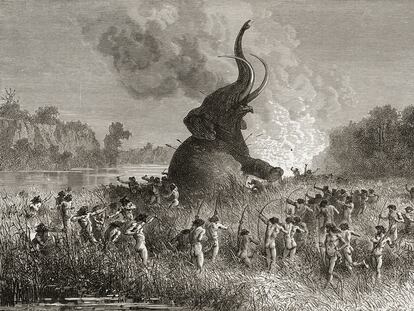 Hombres prehistóricos cazan un mamut en una ilustración de 1896.