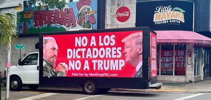 A truck on the streets of Miami with the sign comparing Trump with Castro.