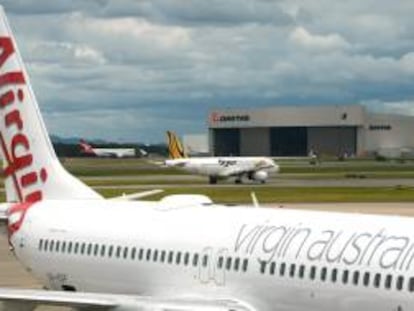La aerolínea Virgin Australia registró pérdidas de unos 75 millones de dólares (54,7 millones de euros) entre el 1 de julio y el 31 de diciembre de 2013, el primer semestre del año fiscal, informó hoy la compañía. EFE/Archivo