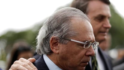 Ministro da Economia, Paulo Guedes, ao lado do presidente Jair Bolsonaro. 