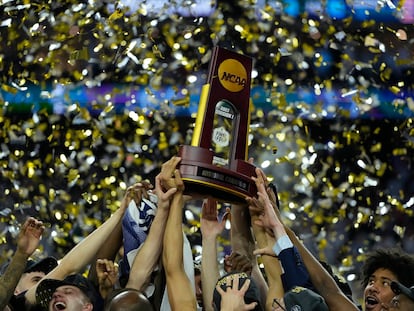 Connecticut Huskies players celebrate after defeating the San Diego State Aztecs in the national championship game of the 2023 NCAA Tournament at NRG Stadium, on April 3, 2023.