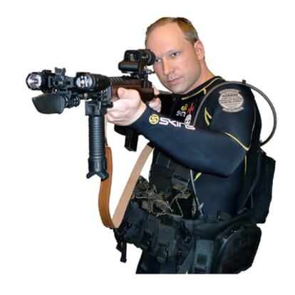 An image of killer Anders Breivik from his Facebook page, showing him dressed in combat gear with a rifle.