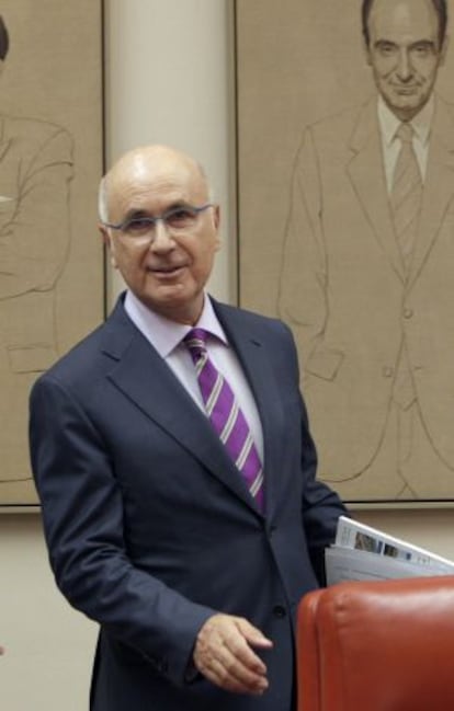 Duran, ayer en el Congreso, junto a un retrato de Miquel Roca, portavoz de CiU en varias legislaturas.