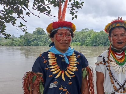 Two members of the Siekopai Nation in a ceremonial act in 2023.