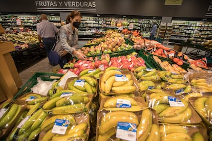 Fruit and vegetables wrapped in plastic at a supermarket in Madrid.