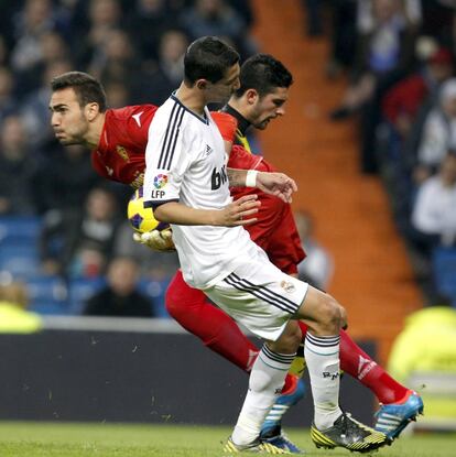 Roberto ante Alvaro y Di Maria.