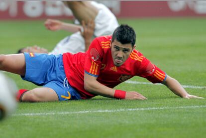 Villa, en el suelo, durante el amistoso contra Corea disputado en Innsbruck.