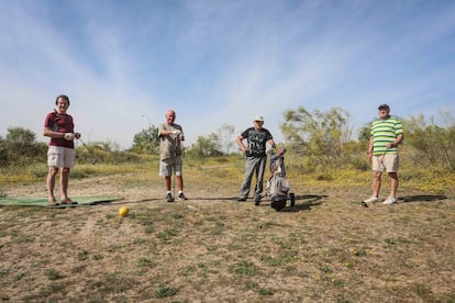 Jugadores en el campo de golf de Pozuelo.