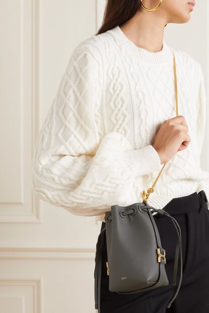 Chloe’s leather bucket bag with a golden chain is the perfect size to accompany you to dinner and parties. €950/$1,230.
