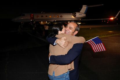 Family members embrace freed American Emad Shargi after he and four fellow detainees arrived at Davison Army Airfield at Fort Belvoir, Virginia, on September 19, 2023.