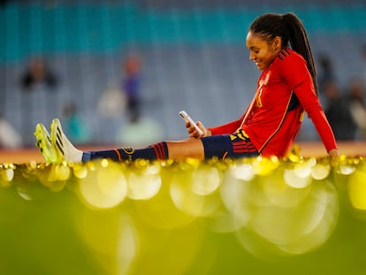 Spain's Salma Paralluelo sits on the pitch with her medal at the end of the Women's World Cup soccer final between Spain and England at Stadium Australia in Sydney, Australia, Sunday, Aug. 20, 2023. Spain won 1-0.