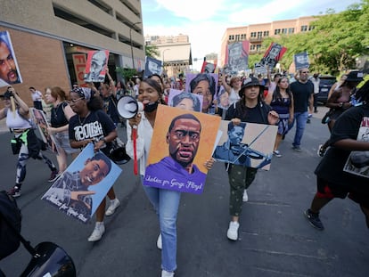 A group of protesters marches after former police officer Derek Chauvin was sentenced to 22.5 years in prison for the murder of George Floyd, in June 2021, in downtown Minneapolis.