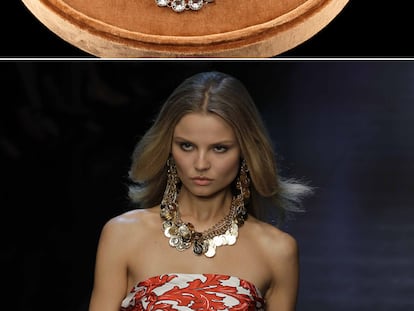 Una modelo del desfile de Dolce&Gabbana en la pasarela de Milán. Arriba, una joya de Prada.