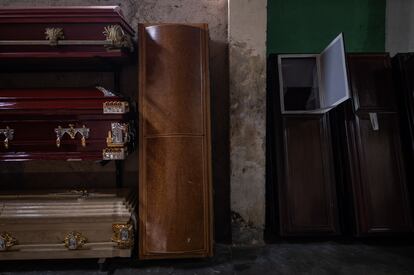 Wooden coffins at a funeral home in Petare (Caracas).