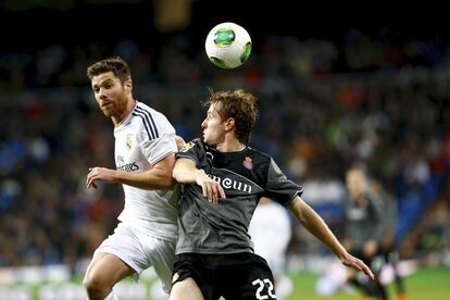 Xabi Alonso con Alex