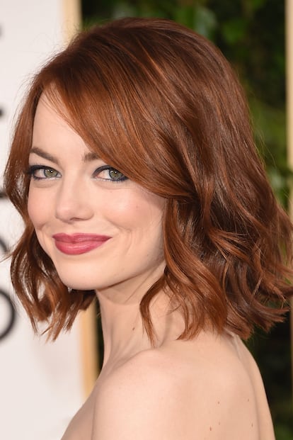 Emma Stone es la 'melenita' del momento. La actriz suele lucirla ligeramente ondulada, un peinado que funciona bien tanto a diario como en ocasiones formales.