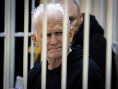 Ales Bialiatski, the head of Belarusian Vyasna rights group, sits in a defendants' cage in Minsk, Belarus, on Thursday, January 5, 2023.