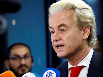 Dutch far-right politician and leader of the PVV party Geert Wilders reacts as he meets the press as parties' lead candidates meet to begin coalition talks in The Hague, Netherlands, November 24, 2023.