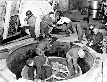 U.S. military personnel dismantle the Nazi experimental reactor at Haigerloch at the end of the war.