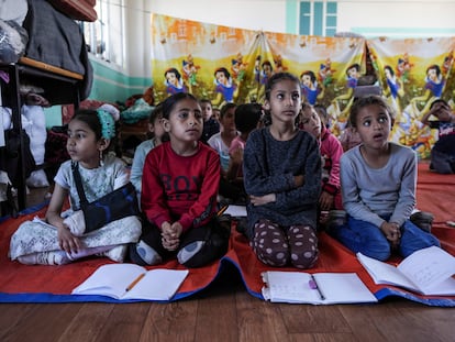 Children attend an activity at a makeshift class in Deir al Balah, on Sunday, April 21, 2024. Since the war erupted Oct 7, all schools in Gaza have closed, and nearly 90% of school buildings are damaged or destroyed, according to aid groups.