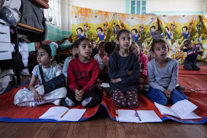 Children attend an activity at a makeshift class in Deir al Balah, on Sunday, April 21, 2024. Since the war erupted Oct 7, all schools in Gaza have closed, and nearly 90% of school buildings are damaged or destroyed, according to aid groups.