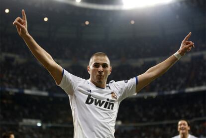 Benzema celebrates his goal, Real's second, against Lyon.