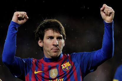 Lionel Messi celebrates one of his goals against Granada.