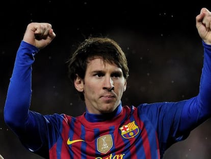 Lionel Messi celebrates one of his goals against Granada.