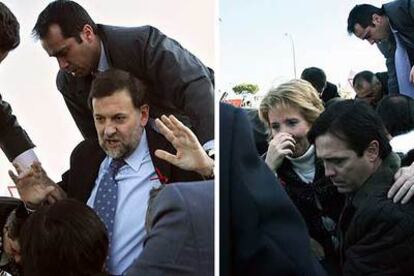 Los escoltas ayudan a Mariano Rajoy y a Esperanza Aguirre a salir del helicóptero, en el que se habían quedado atrapados tras el accidente.