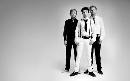 De izquierda a derecha,Dominic Howard, Matt Bellamy y Christopher Wolstenholme, los miembros de Muse.
