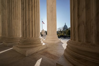 FILE - The Supreme Court is seen in Washington, with the U.S. Capitol in the distance, Nov. 4, 2020.