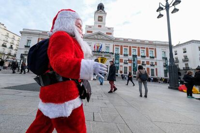 A man dressed as Santa in Madrid’s Puerta del Sol.