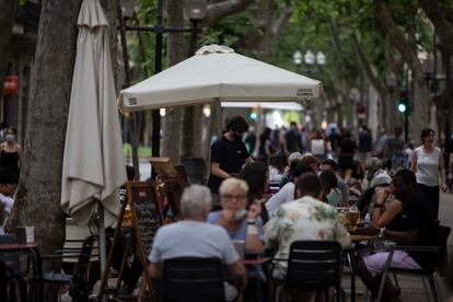 Sidewalk cafés in Rambla del Poblenou in Barcelona.