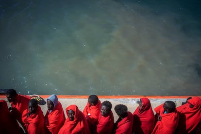 Sub Saharan migrants rescued from the Straits of Gibraltar arrive at the port in Barbate.