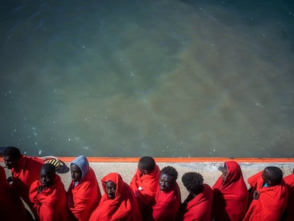 Sub Saharan migrants rescued from the Straits of Gibraltar arrive at the port in Barbate.