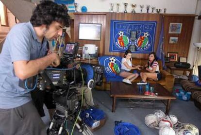 Filming on the spoof porn film to lure soccer fans to Getafe's Coliseum stadium.