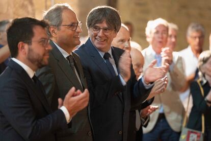 Pere Aragonès y Carles Puigdemont, separados por Quim Torra, en un acto de homenaje al músico Pau Casals, el mes pasado en Prada de Conflent, en el sur de Francia.